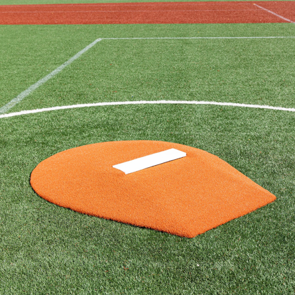 The Portolite 6” Oversized Stride Off Game Mound is perfect for players 13 and under, featuring tapered edges, durable turf, and is only 60 lbs for easy portability