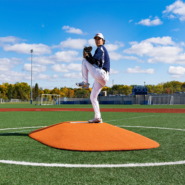 The Portolite 8” One Piece Game Mound is ideal for ages 14+, featuring tapered edges, durable turf, and easy portability with a small group