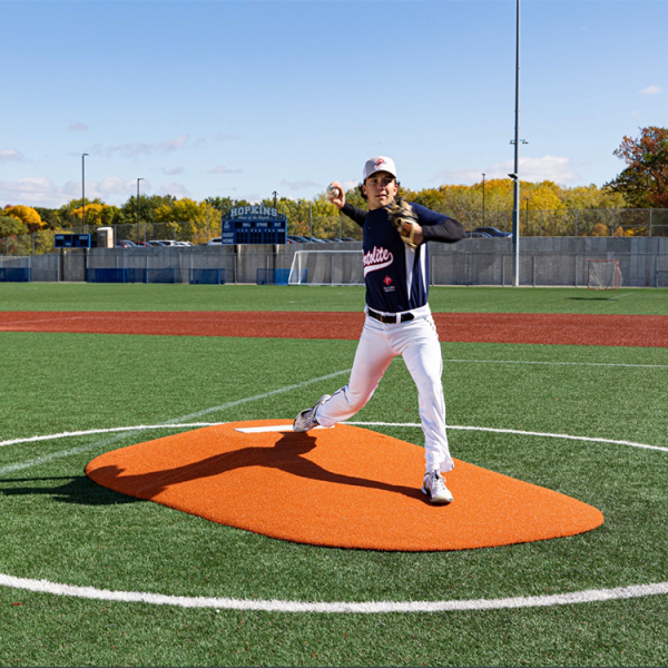 The Portolite 8” Two Piece Game Mound is ideal for ages 14+, featuring tapered edges, durable turf, and easy portability with two lightweight sections