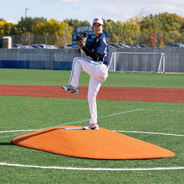 The Portolite 10” One Piece Game Mound is perfect for ages 16+, featuring tapered edges, durable turf, and easy field transport with a group