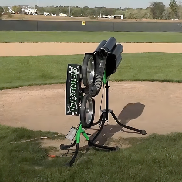 The Spinball Small Turret Feeder holds 35 baseballs or 29 softballs, works with standard machines, and includes a wireless remote for efficient solo or group practice